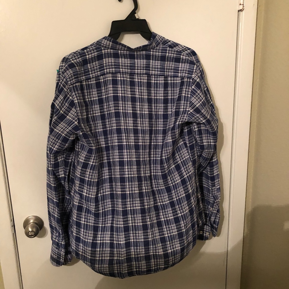 Long sleeved blue plaid shirt